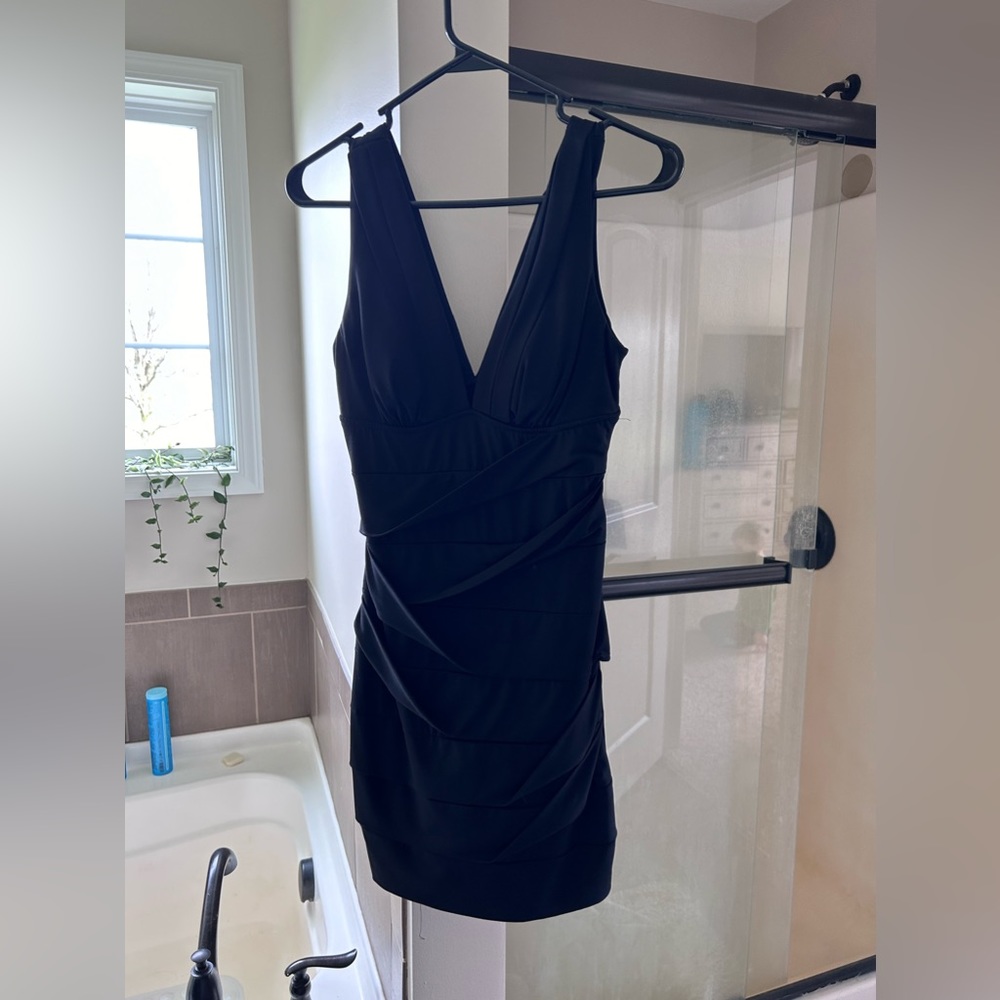 Black ruched mini dress.